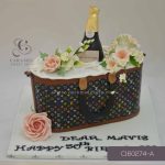 Louis Vuitton with Wine Bottle Themed Cake