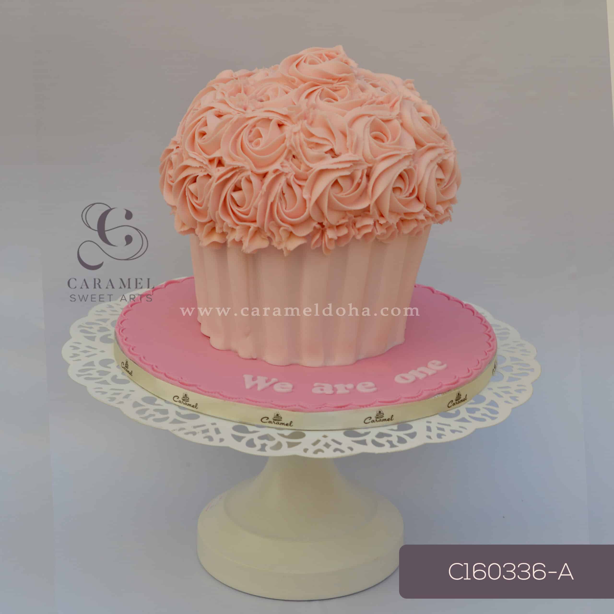 c160336-a-scaled-1.jpg 3D Pink Cupcake Themed Cake - Image 1