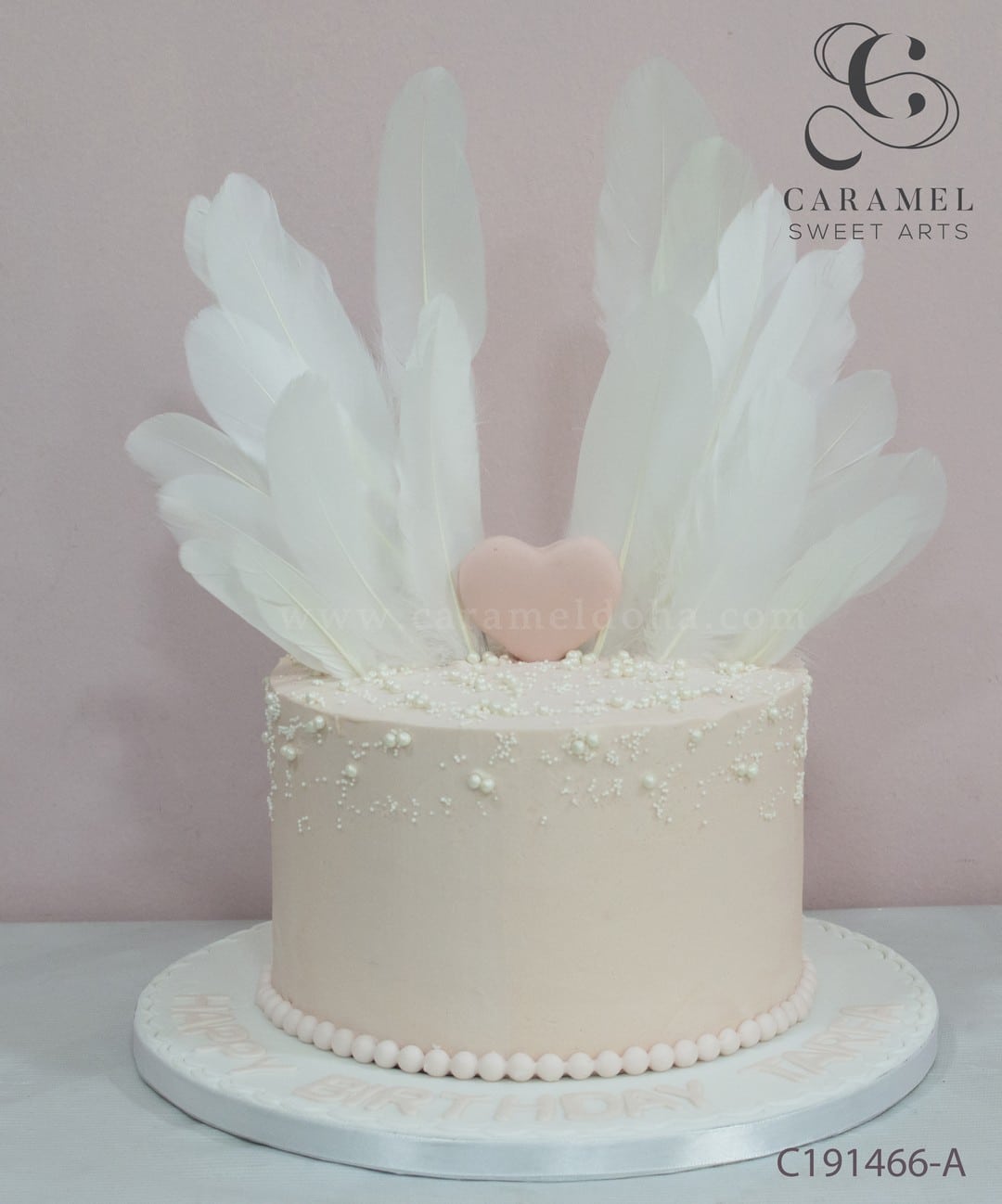 c191466-a.jpg Feather Cake - Image 1